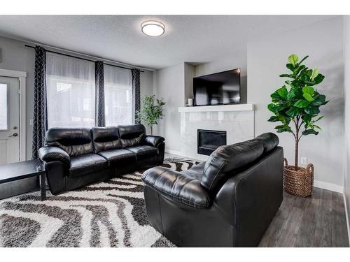 31 Sherview Grove Nw, Calgary, AB - Indoor Photo Showing Living Room With Fireplace