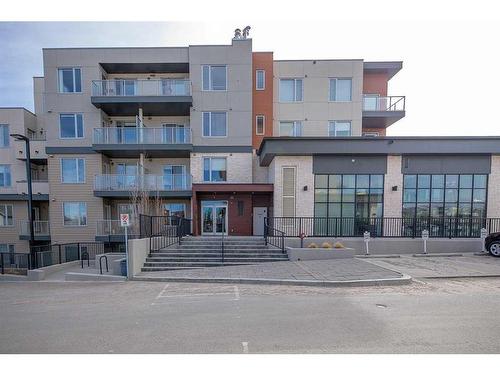 16-30 Shawnee Common Sw, Calgary, AB - Outdoor With Facade