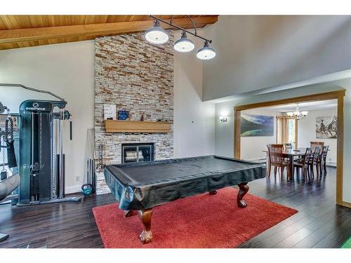 115 Lansdown Estates, Rural Rocky View County, AB - Indoor With Fireplace