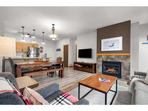 226-101 Montane Road, Canmore, AB - Indoor Photo Showing Living Room With Fireplace