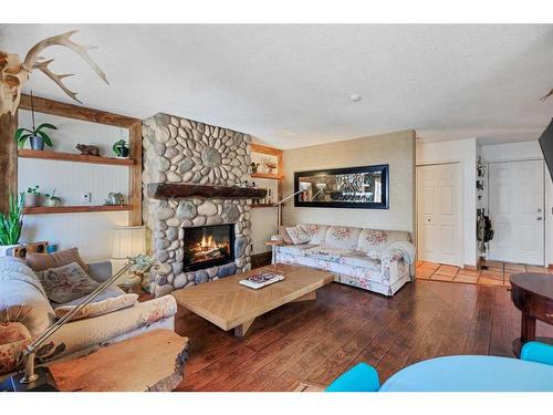 287 Harvest Creek Close Ne, Calgary, AB - Indoor Photo Showing Living Room With Fireplace