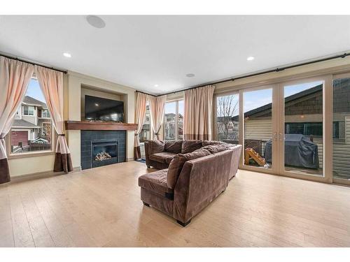 50 Auburn Shores Way Se, Calgary, AB - Indoor Photo Showing Living Room With Fireplace