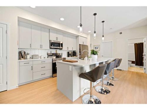 3102-220 Seton Grove Se, Calgary, AB - Indoor Photo Showing Kitchen With Stainless Steel Kitchen With Upgraded Kitchen