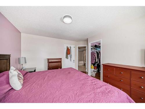 163 Eversyde Circle Sw, Calgary, AB - Indoor Photo Showing Bedroom