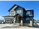 2 Heritage Close, Cochrane, AB  - Outdoor With Facade 