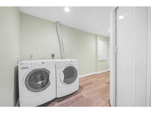 4 West Tower Place, Cochrane, AB - Indoor Photo Showing Laundry Room