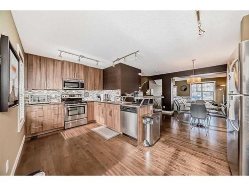 211 Mckenzie Towne Link Se, Calgary, AB - Indoor Photo Showing Kitchen With Stainless Steel Kitchen