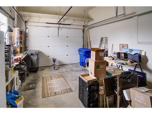4 Skyline Mews, Claresholm, AB - Indoor Photo Showing Garage