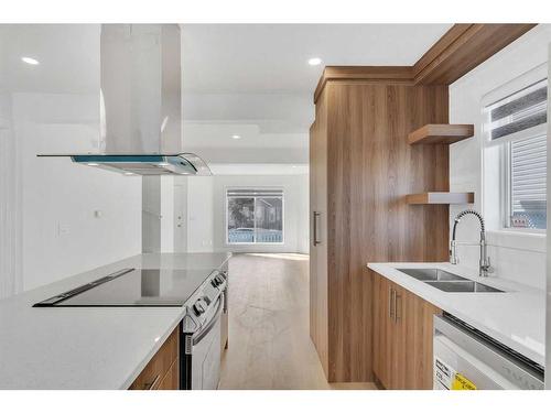 109 Taradale Close Ne, Calgary, AB - Indoor Photo Showing Kitchen With Double Sink