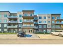 210-200 Shawnee Square Sw, Calgary, AB  - Outdoor With Facade 