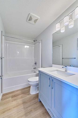 210-200 Shawnee Square Sw, Calgary, AB - Indoor Photo Showing Bathroom