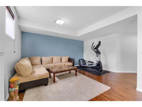 300 Lakeside Greens Crescent, Chestermere, AB - Indoor Photo Showing Gym Room