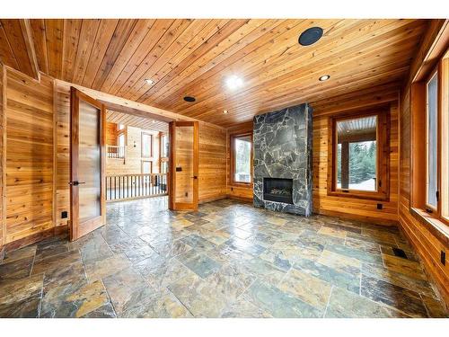 280231 Grand Valley Road, Rural Rocky View County, AB -  Photo Showing Other Room With Fireplace