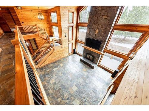 280231 Grand Valley Road, Rural Rocky View County, AB - Indoor With Fireplace