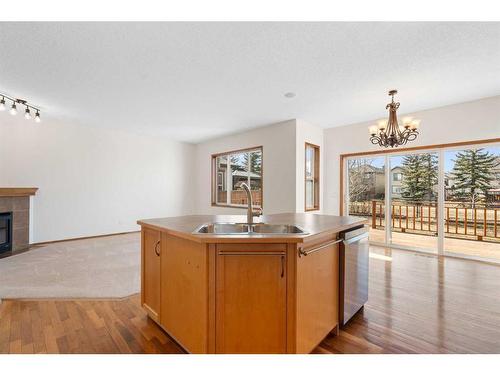 27 Cranfield Circle Se, Calgary, AB - Indoor Photo Showing Other Room With Fireplace