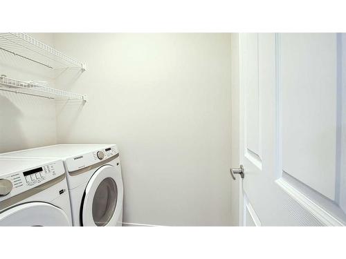43 Carringwood Manor Nw, Calgary, AB - Indoor Photo Showing Laundry Room