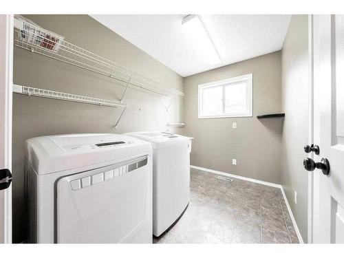 20 Mt Cascade Close Se, Calgary, AB - Indoor Photo Showing Laundry Room
