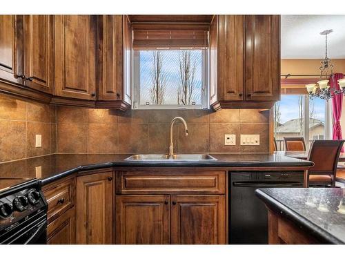 32 Royal Road Nw, Calgary, AB - Indoor Photo Showing Kitchen With Double Sink