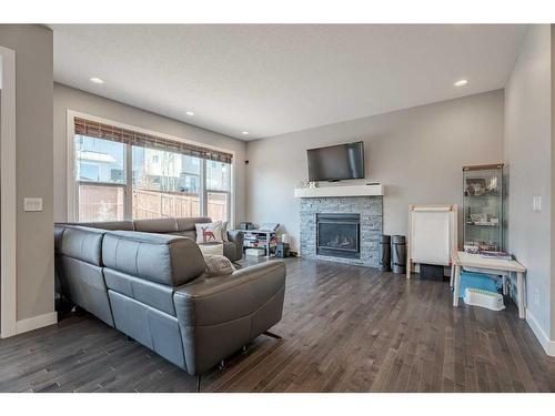 55 Nolancrest Rise Nw, Calgary, AB - Indoor Photo Showing Living Room With Fireplace