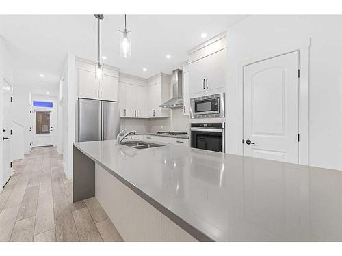 204 Seton Villas Se, Calgary, AB - Indoor Photo Showing Kitchen With Stainless Steel Kitchen With Double Sink With Upgraded Kitchen