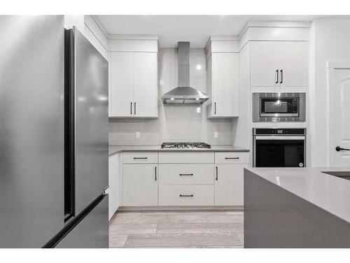 204 Seton Villas Se, Calgary, AB - Indoor Photo Showing Kitchen