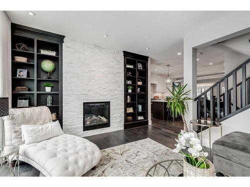 7 Dieppe Drive Sw, Calgary, AB - Indoor Photo Showing Living Room With Fireplace
