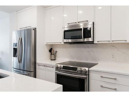 301-317 22 Avenue Sw, Calgary, AB - Indoor Photo Showing Kitchen With Stainless Steel Kitchen