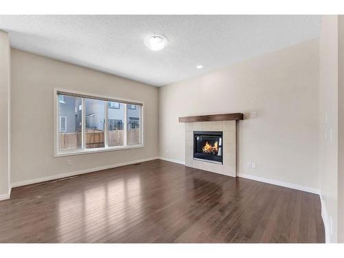 52 Savanna Grove Ne, Calgary, AB - Indoor Photo Showing Living Room With Fireplace