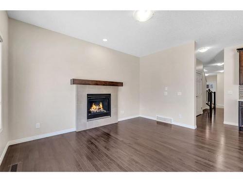 52 Savanna Grove Ne, Calgary, AB - Indoor Photo Showing Living Room With Fireplace