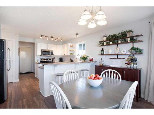56 Silver Creek Boulevard Nw, Airdrie, AB - Indoor Photo Showing Dining Room