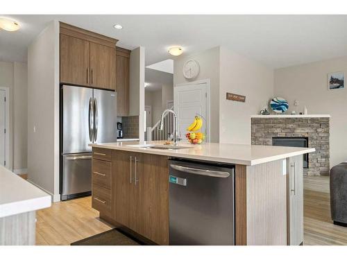 41 Hanson Lane Ne, Langdon, AB - Indoor Photo Showing Kitchen With Stainless Steel Kitchen