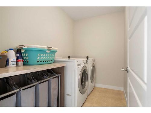 41 Hanson Lane Ne, Langdon, AB - Indoor Photo Showing Laundry Room