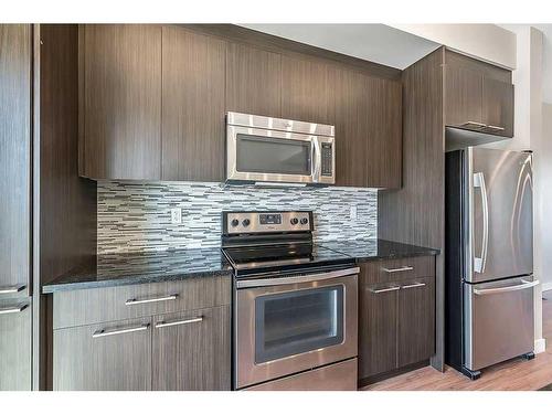 64-300 Marina Drive, Chestermere, AB - Indoor Photo Showing Kitchen