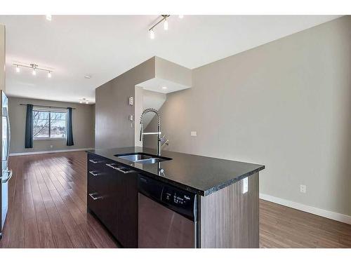64-300 Marina Drive, Chestermere, AB - Indoor Photo Showing Kitchen With Double Sink