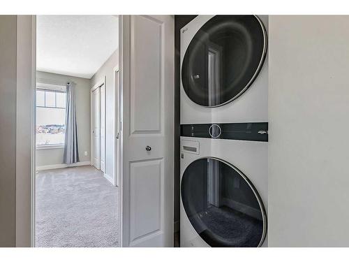 64-300 Marina Drive, Chestermere, AB - Indoor Photo Showing Laundry Room