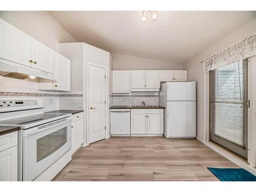 90 Valley Ridge Heights Nw, Calgary, AB - Indoor Photo Showing Other Room With Fireplace