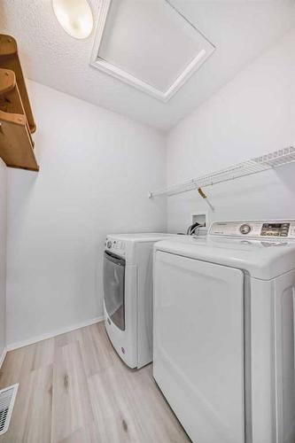 90 Valley Ridge Heights Nw, Calgary, AB - Indoor Photo Showing Laundry Room