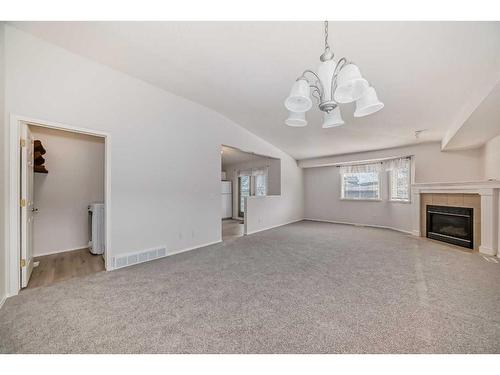 90 Valley Ridge Heights Nw, Calgary, AB - Indoor With Fireplace