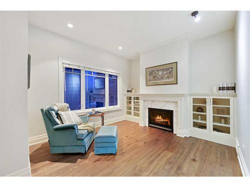 49 Mayfair Road Sw, Calgary, AB - Indoor Photo Showing Living Room With Fireplace