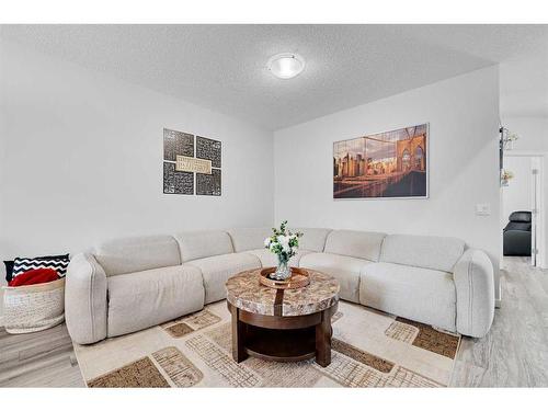 105 Legacy Glen Point Se, Calgary, AB - Indoor Photo Showing Living Room