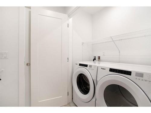 136 Merganser Drive West, Chestermere, AB - Indoor Photo Showing Laundry Room