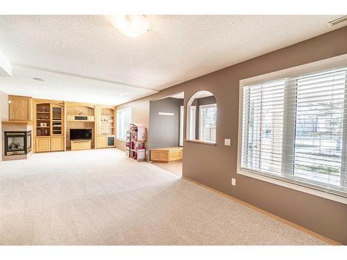 59 Schooner Close Nw, Calgary, AB - Indoor With Fireplace