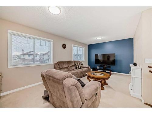 15 Everwoods Green Sw, Calgary, AB - Indoor Photo Showing Living Room