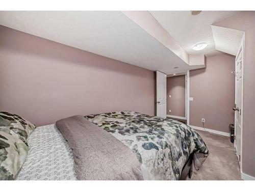 15 Everwoods Green Sw, Calgary, AB - Indoor Photo Showing Bedroom