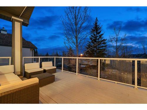 438 Rocky Ridge Cove Nw, Calgary, AB - Outdoor With Deck Patio Veranda With Exterior
