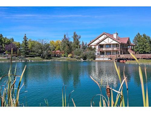 438 Rocky Ridge Cove Nw, Calgary, AB - Outdoor With Body Of Water With View