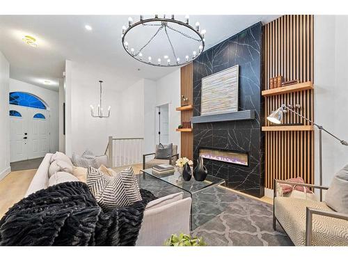 438 Rocky Ridge Cove Nw, Calgary, AB - Indoor With Fireplace