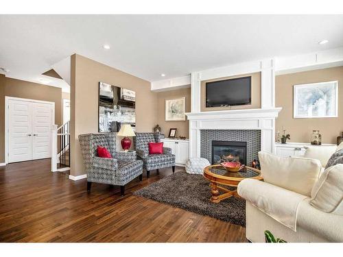 49 Legacy Terrace Se, Calgary, AB - Indoor Photo Showing Living Room With Fireplace