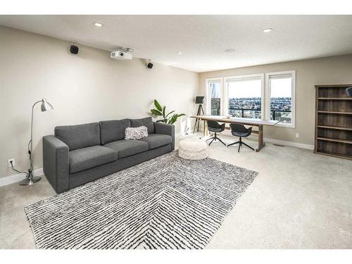 7 Springbluff Point Sw, Calgary, AB - Indoor Photo Showing Living Room