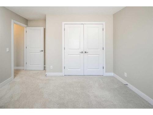 7 Springbluff Point Sw, Calgary, AB - Indoor Photo Showing Other Room